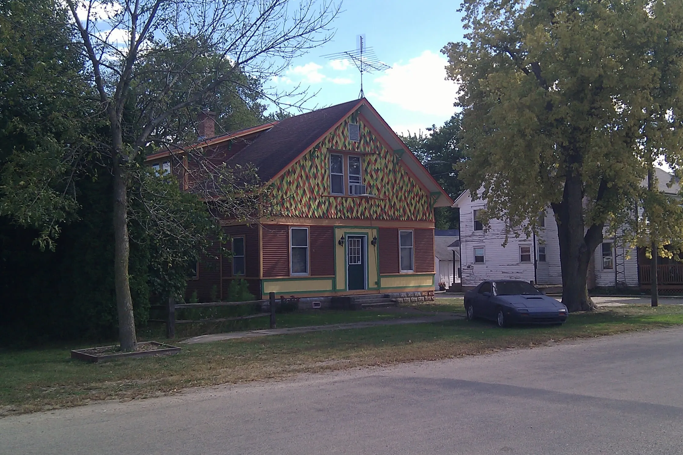 an unusually tiled house in fall colors